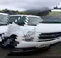 IMAX Private Transfer 7 Guests Cairns Airport to Hotels in Cairns City - Tourism Noosa
