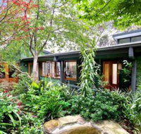 The Black Cockatoo Secret Garden Mountains Home - Tourism Noosa