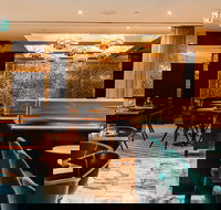 THE DEN - Tourism Noosa